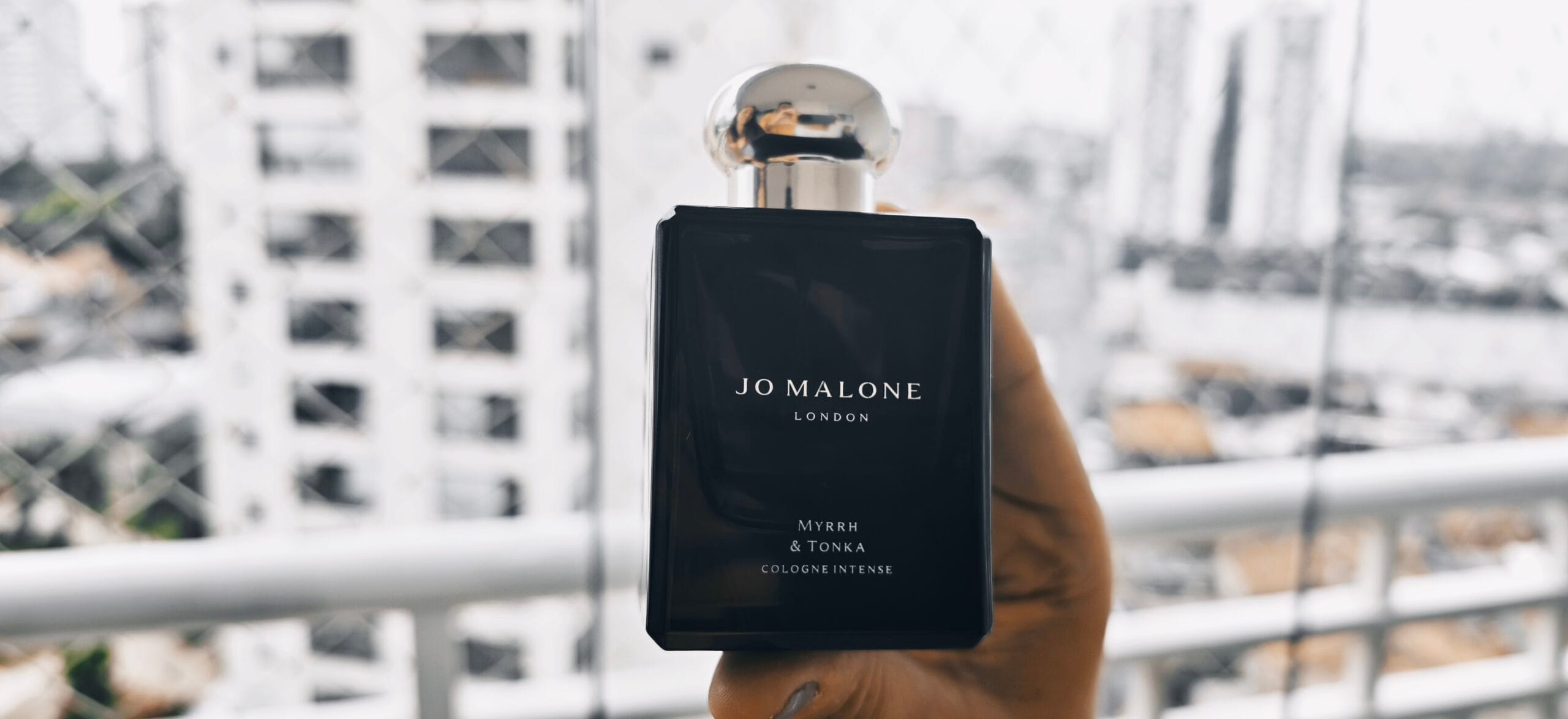 Jo Malone Myrrh & Tonka Cologne Intense — bottle in evening light