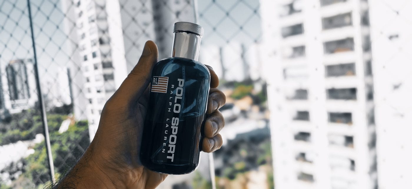 Ralph Lauren Polo Sport held up against São Paulo city skyline — personal review by Felipe Vides