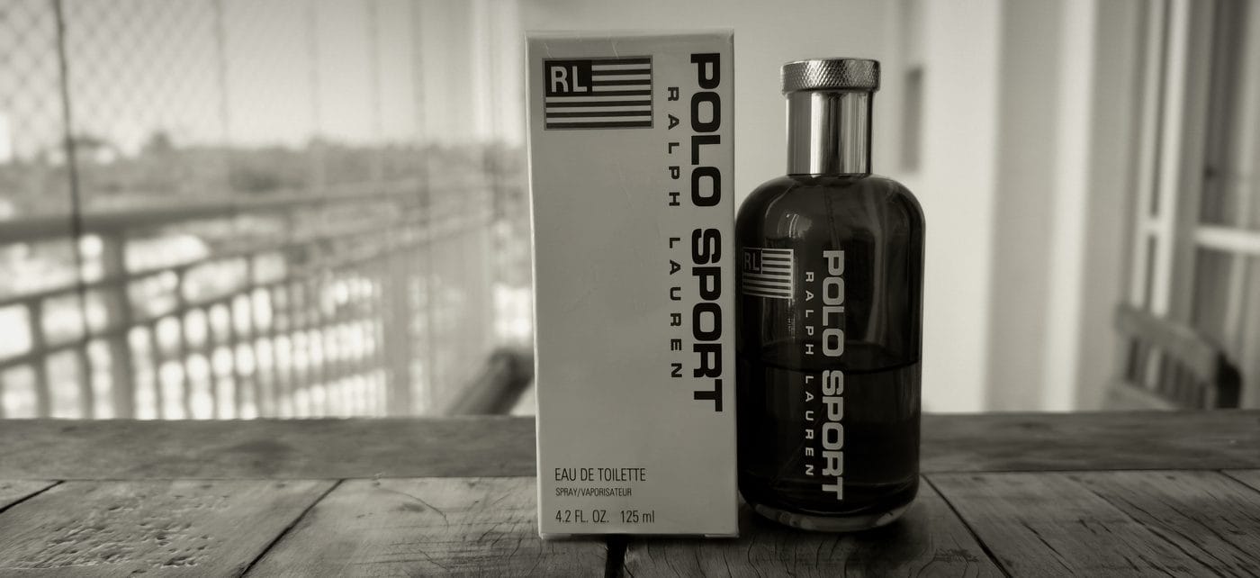 Ralph Lauren Polo Sport sealed box and open bottle side by side — vintage vs current formula